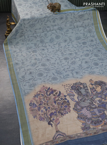 Tissue silk saree pastel blue shade with allover kalamkari prints and zari woven border