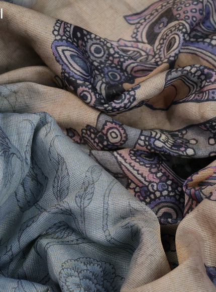 Tissue silk saree pastel blue shade with allover kalamkari prints and zari woven border