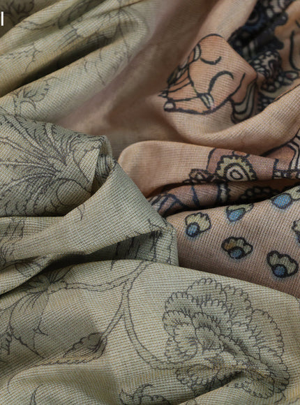 Tissue silk saree pastel green with allover kalamkari prints and zari woven border