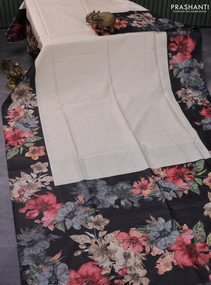 Semi tussar saree cream and black with plain body and floral digital printed border