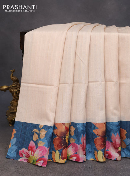 Semi tussar saree cream and peacock blue with plain body and floral digital printed border