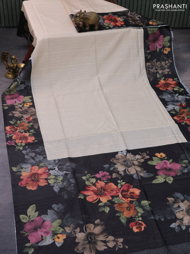 Semi tussar saree cream and black with plain body and floral digital printed border