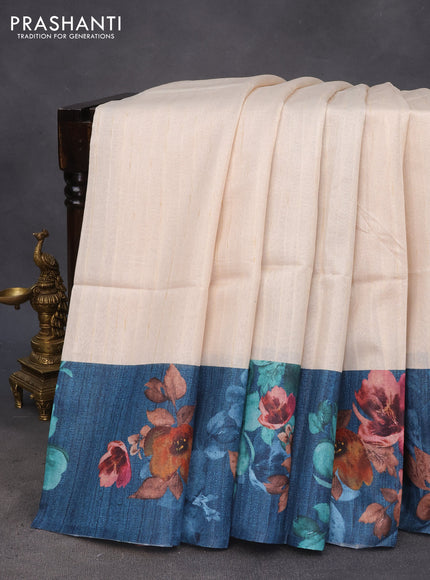 Semi tussar saree cream and peacock blue with plain body and floral digital printed border