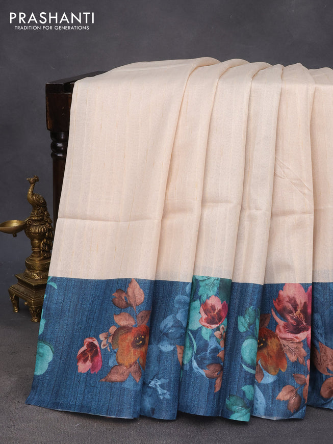 Semi tussar saree cream and peacock blue with plain body and floral digital printed border