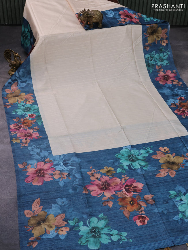 Semi tussar saree cream and peacock blue with plain body and floral digital printed border