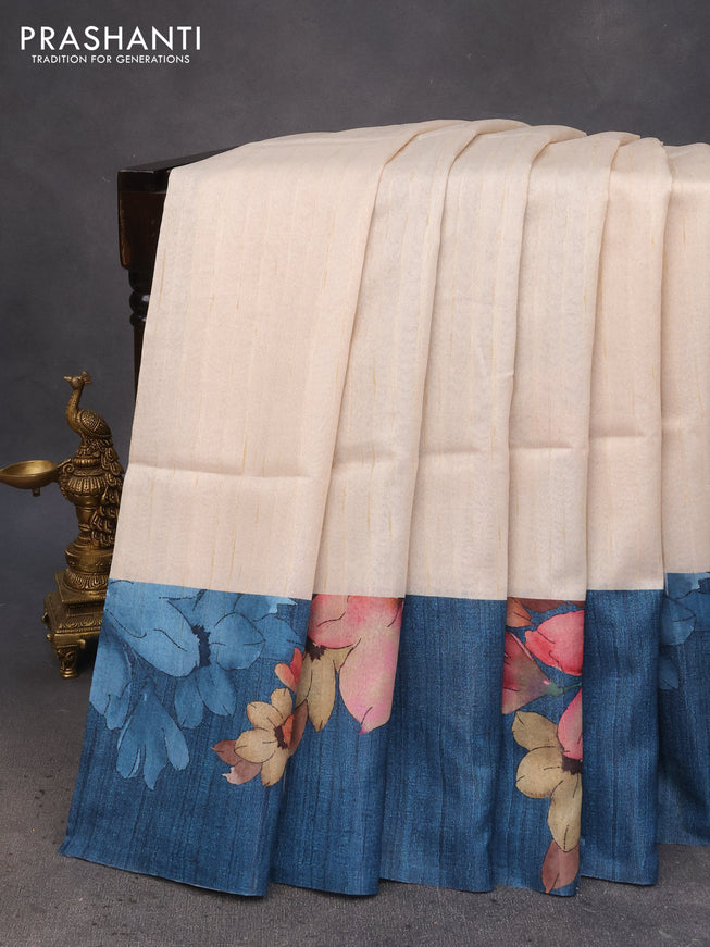 Semi tussar saree cream and peacock blue with plain body and floral digital printed border