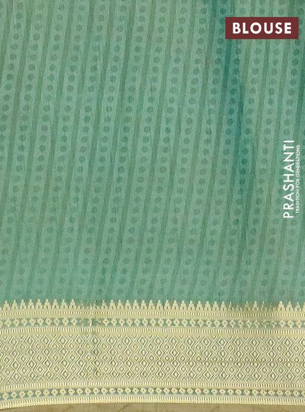 Semi tussar saree pink and green shade with allover ikat prints and zari woven border