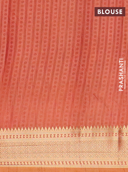 Semi tussar saree green and rust shade with allover ikat prints and zari woven border