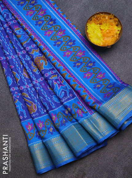 Semi tussar saree blue and cs blue with allover ikat prints and zari woven border