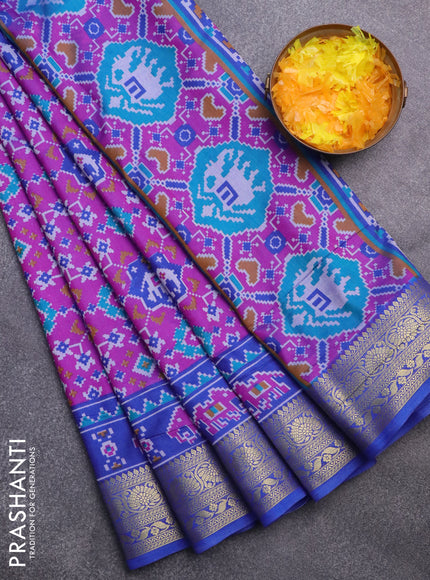 Semi tussar saree purple and blue with allover ikat prints and zari woven border