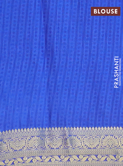 Semi tussar saree purple and blue with allover ikat prints and zari woven border