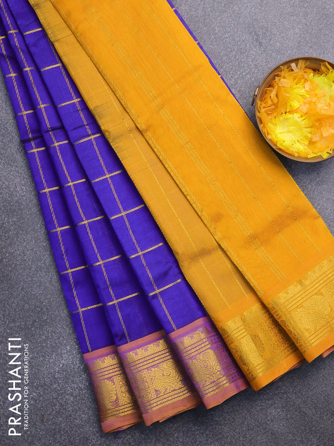 Silk cotton saree blue and mustard yellow with allover zari checked pattern and zari woven border