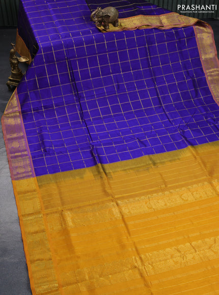 Silk cotton saree blue and mustard yellow with allover zari checked pattern and zari woven border