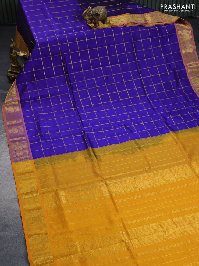 Silk cotton saree blue and mustard yellow with allover zari checked pattern and zari woven border