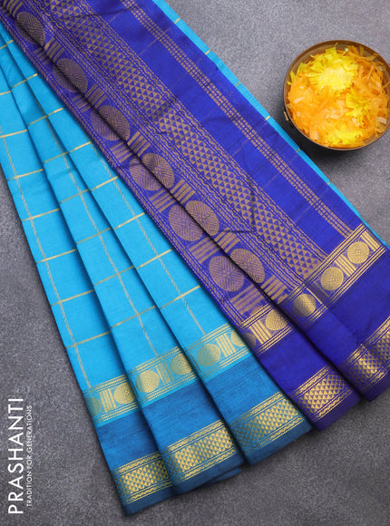 Silk cotton saree teal blue and blue with allover zari checked pattern and rettapet zari woven border