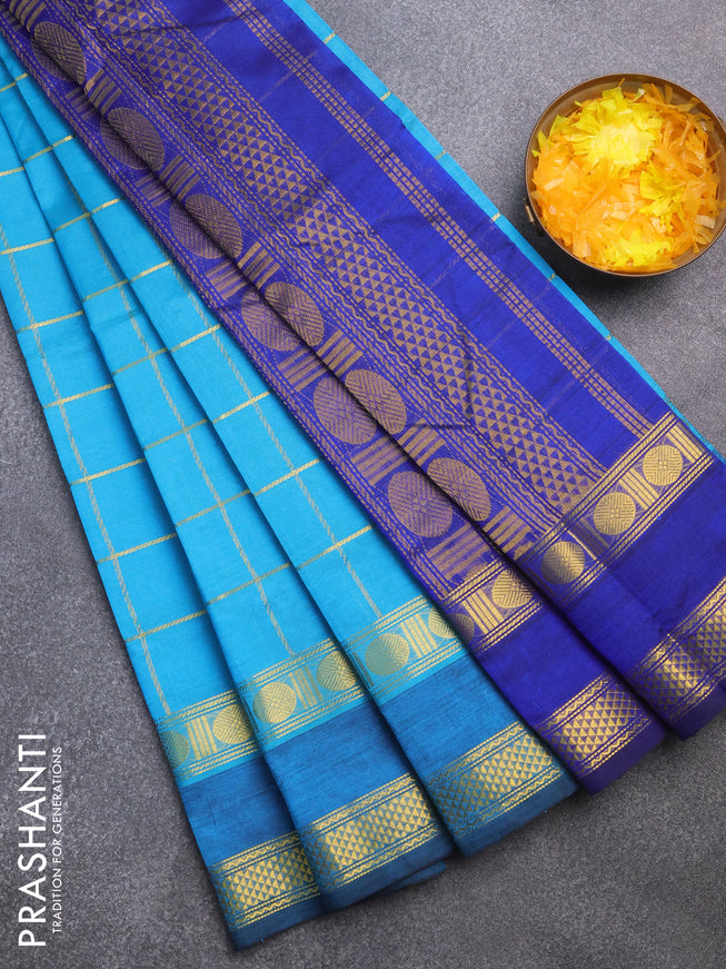 Silk cotton saree teal blue and blue with allover zari checked pattern and rettapet zari woven border