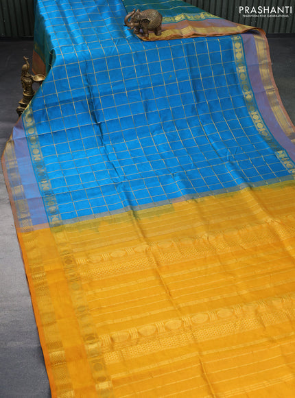 Silk cotton saree cs blue and mustard yellow with allover zari checked pattern and rettapet zari woven border