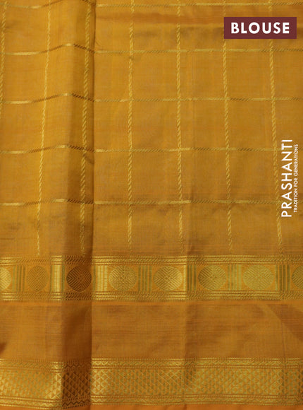 Silk cotton saree cs blue and mustard yellow with allover zari checked pattern and rettapet zari woven border