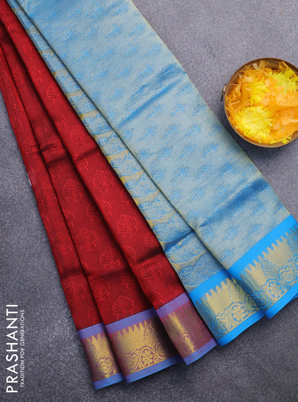 Silk cotton saree maroon and cs blue with allover self emboss & jacquard and zari woven border