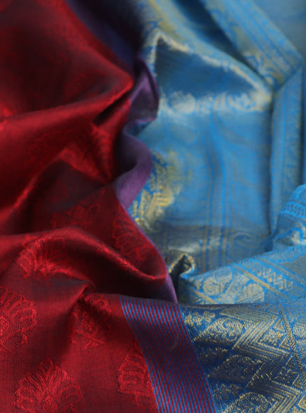 Silk cotton saree maroon and cs blue with allover self emboss & jacquard and zari woven border