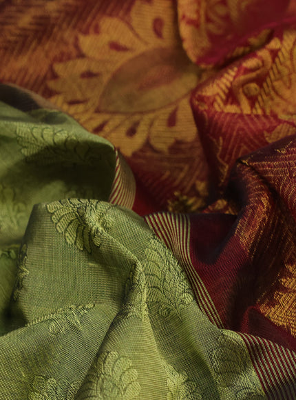 Silk cotton saree pastel green and maroon with allover self emboss & jacquard and annam zari woven border