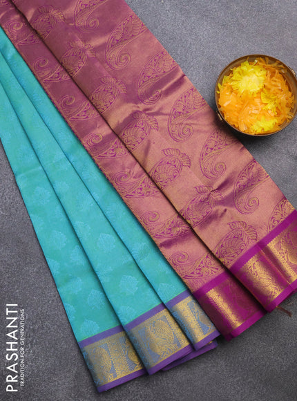 Silk cotton saree dual shade of teal green shade and purple with allover self emboss & jacquard and annam zari woven border