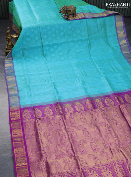 Silk cotton saree dual shade of teal green shade and purple with allover self emboss & jacquard and annam zari woven border