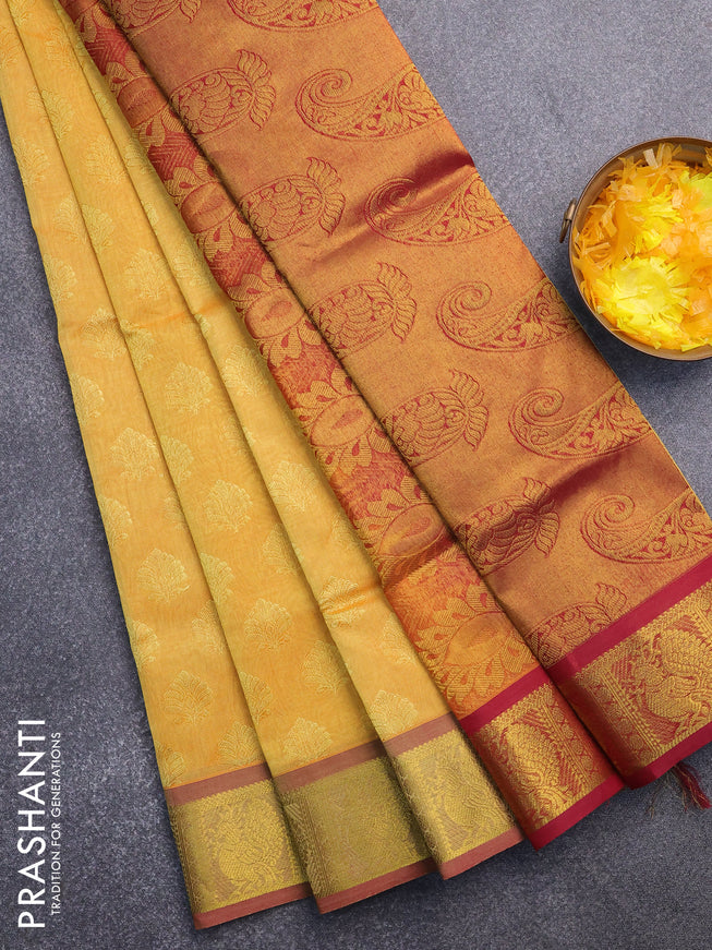 Silk cotton saree yellow and maroon with allover self emboss & jacquard and annam zari woven border