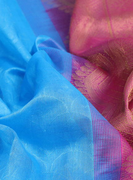 Silk cotton saree light blue and pink with allover self emboss & jacquard and zari woven border