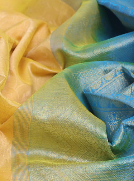 Silk cotton saree yellow and cs blue with allover self emboss & jacquard and zari woven border