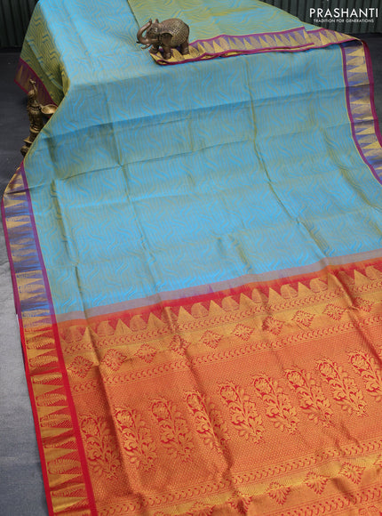 Silk cotton saree dual shade of bluish yellow and red with allover self emboss & jacquard and zari woven border