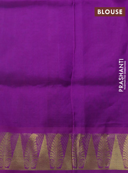 Silk cotton saree dual shade of teal bluish green and purple with allover self emboss & jacquard and zari woven border