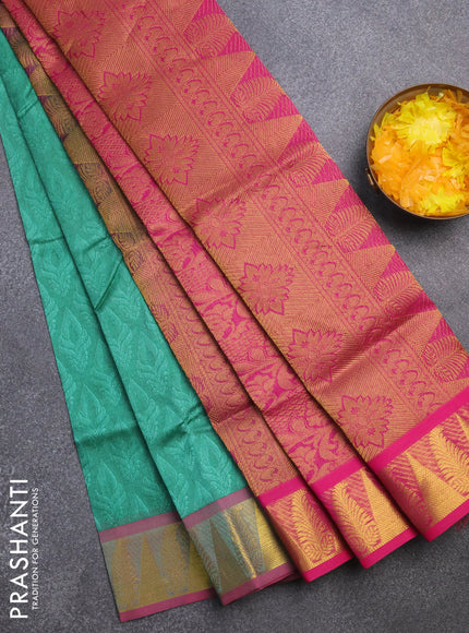 Silk cotton saree green and pink with allover self emboss & jacquard and zari woven border