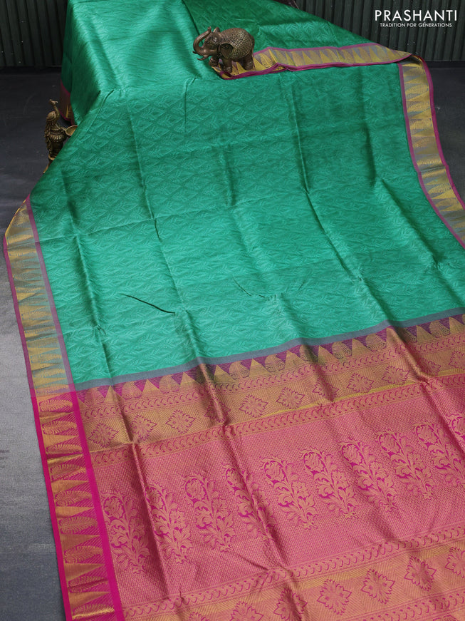 Silk cotton saree green and pink with allover self emboss & jacquard and zari woven border