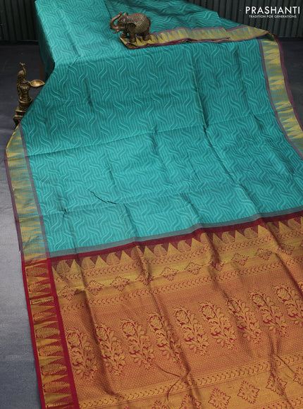 Silk cotton saree green shade and maroon with allover self emboss & jacquard and zari woven border