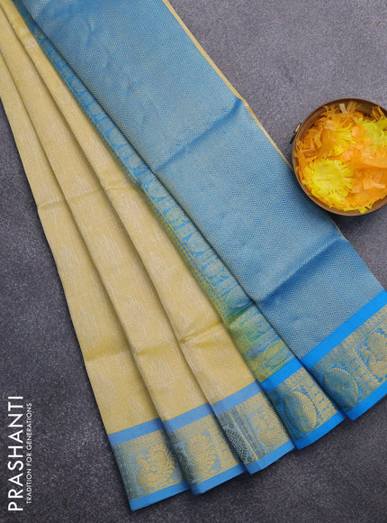 Silk cotton saree pale yellow and cs blue with allover self emboss & jacquard and annam & rudhraksha zari woven border