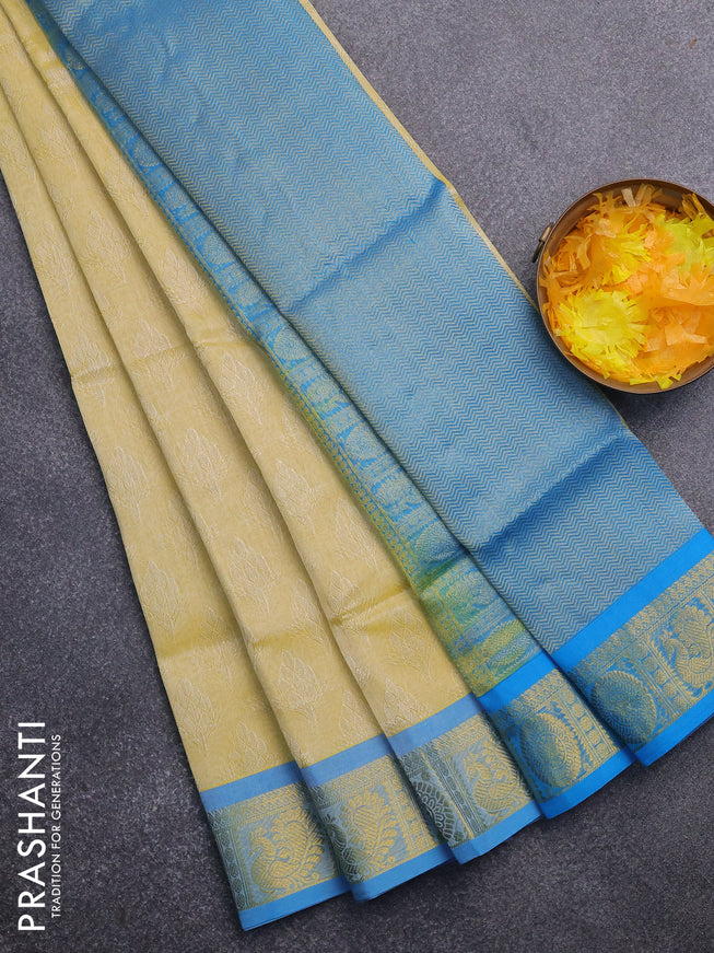 Silk cotton saree pale yellow and cs blue with allover self emboss & jacquard and annam & rudhraksha zari woven border