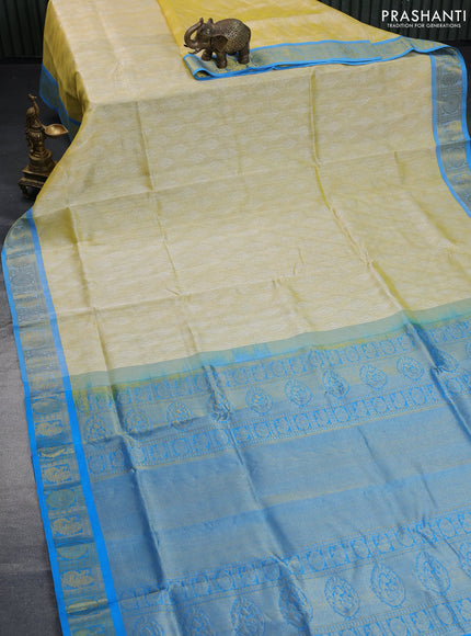 Silk cotton saree pale yellow and cs blue with allover self emboss & jacquard and annam & rudhraksha zari woven border