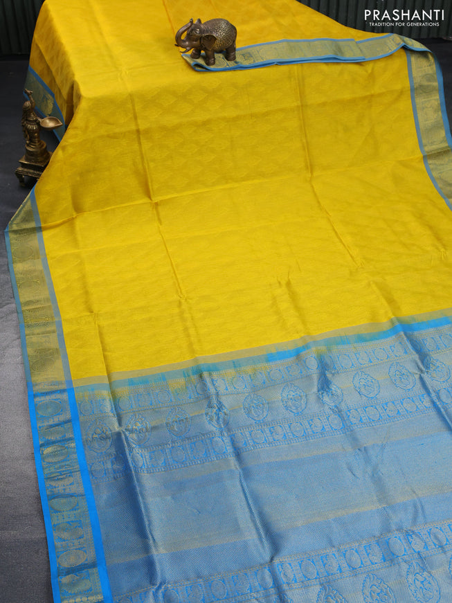 Silk cotton saree mango yellow and cs blue with allover self emboss & jacquard and annam & rudhraksha zari woven border