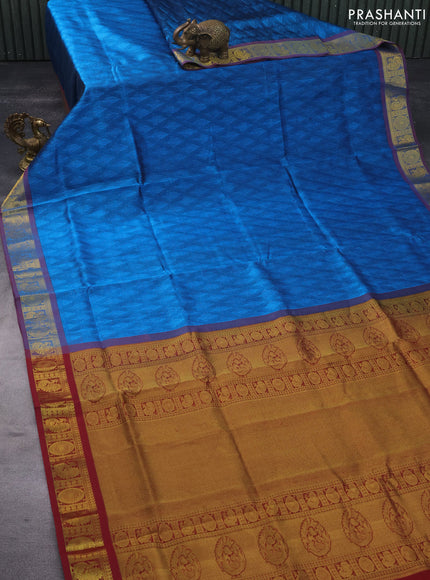 Silk cotton saree cs blue and maroon with allover self emboss & jacquard and annam & rudhraksha zari woven border