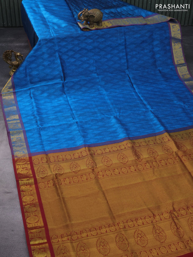 Silk cotton saree cs blue and maroon with allover self emboss & jacquard and annam & rudhraksha zari woven border