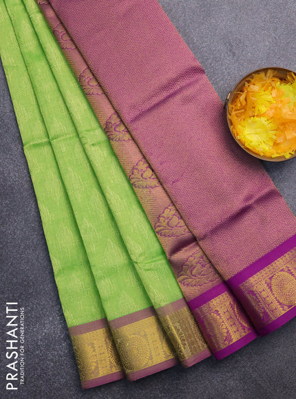 Silk cotton saree light green and purple with allover self emboss & jacquard and annam & rudhraksha zari woven border