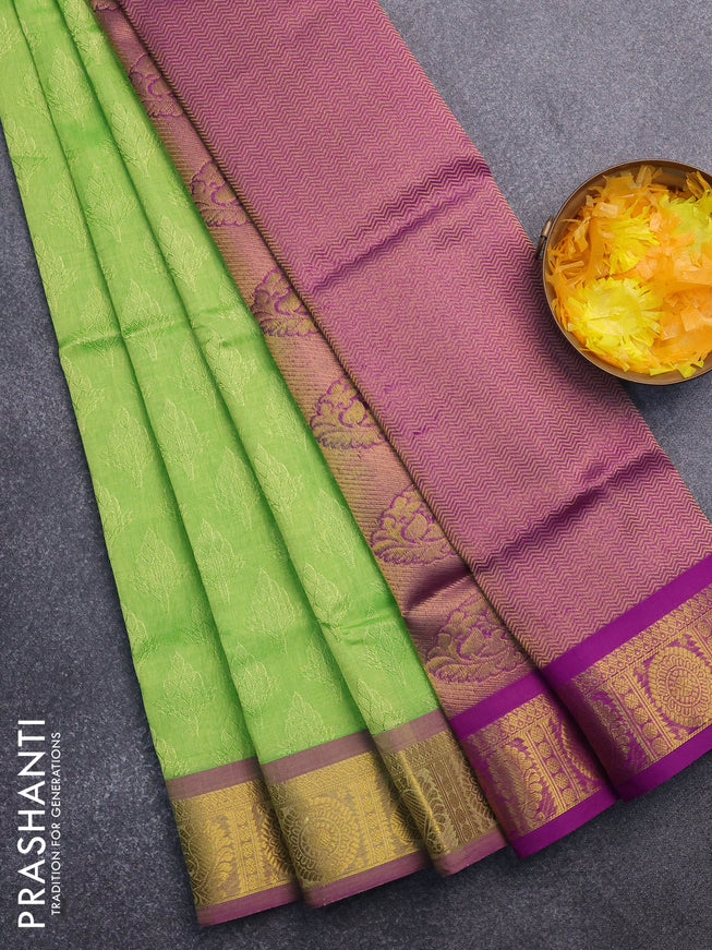 Silk cotton saree light green and purple with allover self emboss & jacquard and annam & rudhraksha zari woven border