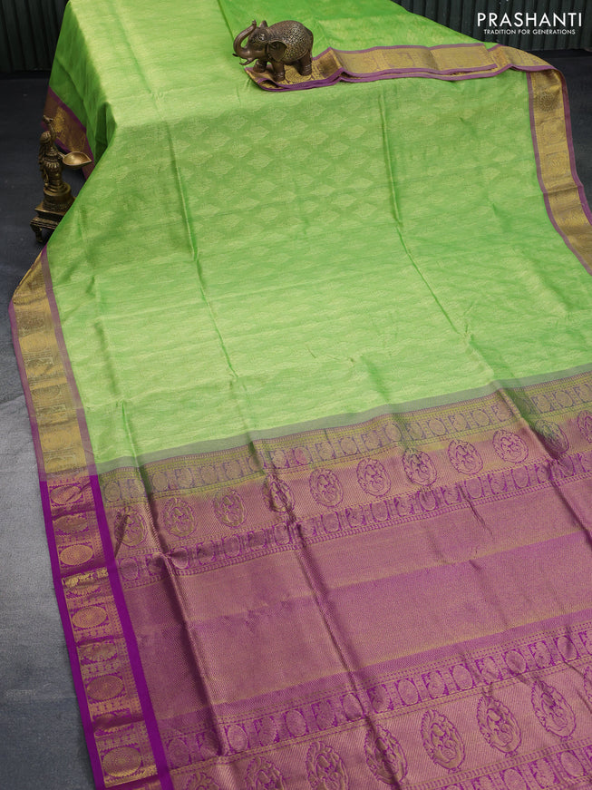 Silk cotton saree light green and purple with allover self emboss & jacquard and annam & rudhraksha zari woven border