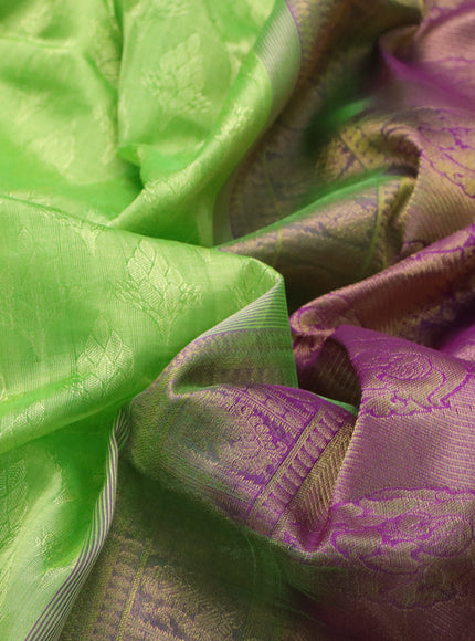 Silk cotton saree light green and purple with allover self emboss & jacquard and annam & rudhraksha zari woven border