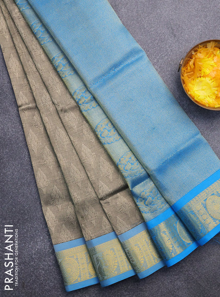 Silk cotton saree beige and cs blue with allover self emboss & jacquard and annam & rudhraksha zari woven border