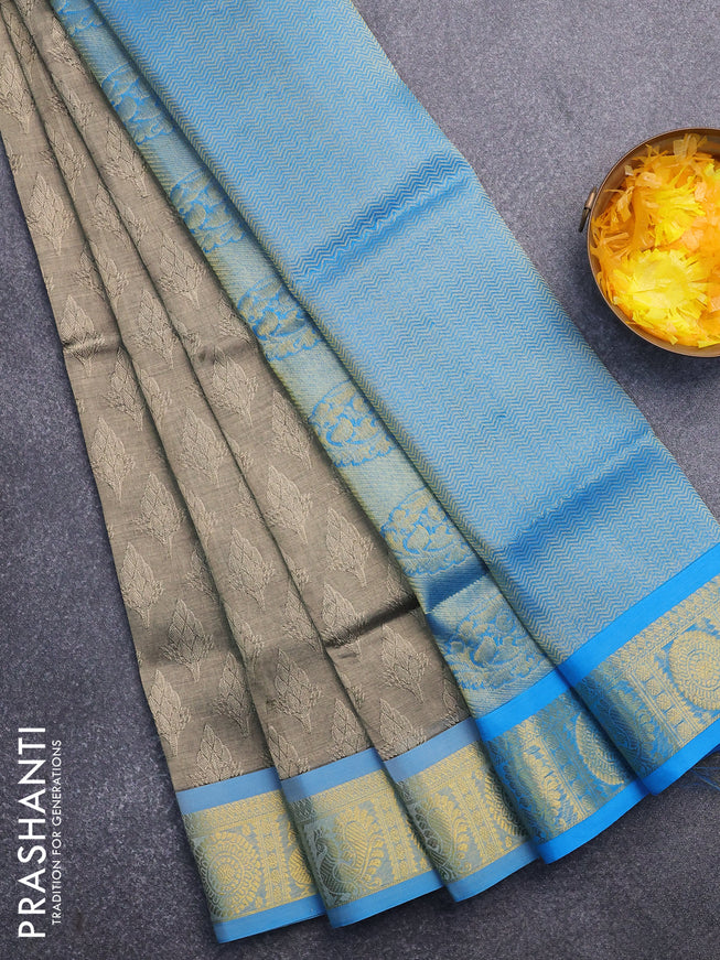 Silk cotton saree beige and cs blue with allover self emboss & jacquard and annam & rudhraksha zari woven border