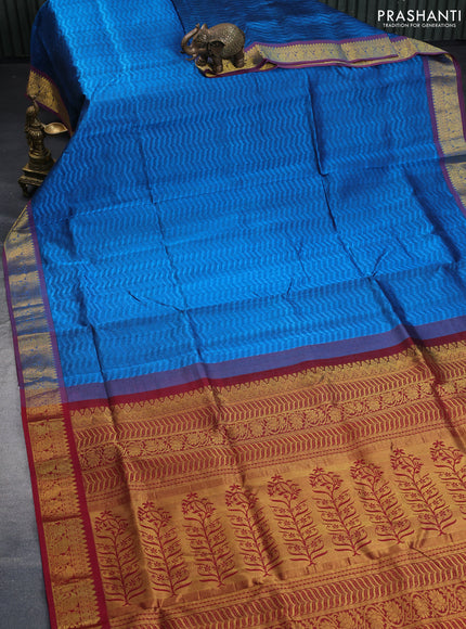 Silk cotton saree cs blue and maroon with allover self emboss & jacquard and zari woven border