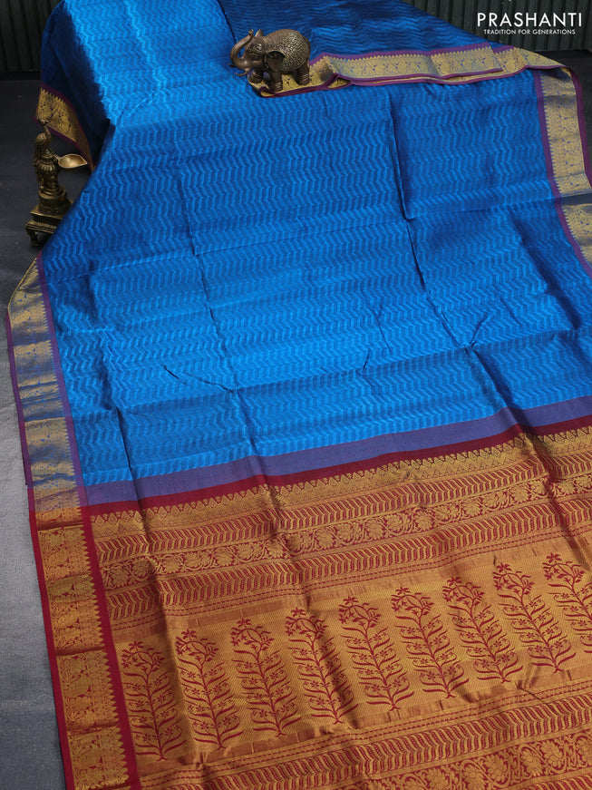 Silk cotton saree cs blue and maroon with allover self emboss & jacquard and zari woven border