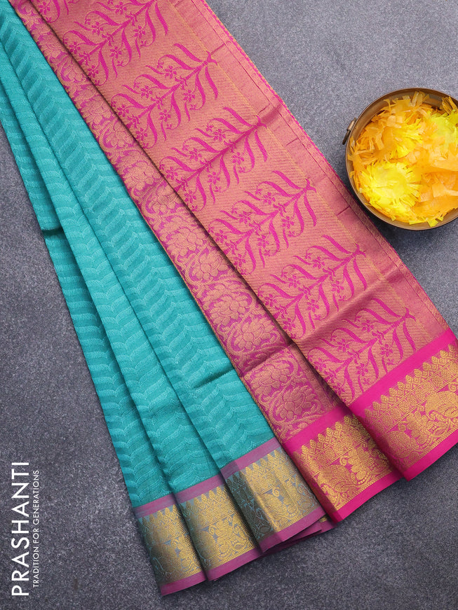 Silk cotton saree teal green and pink with allover self emboss & jacquard and zari woven border